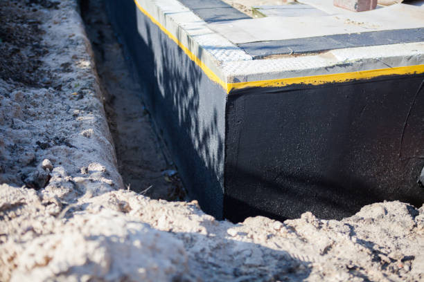 Professional Interior Drainage System technician working in South Bloomingville, OH